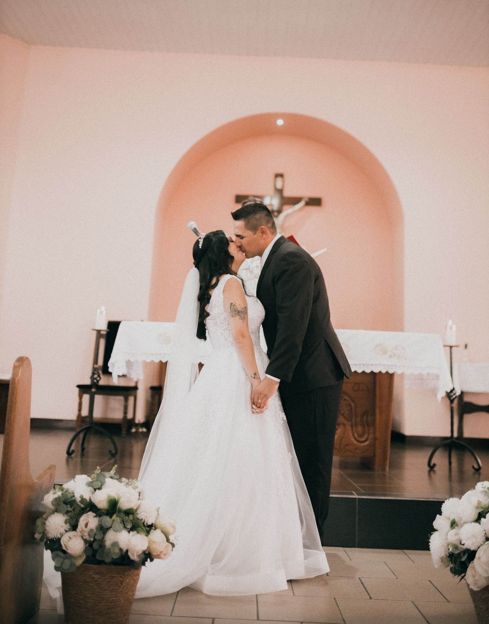 The first kiss at the altar